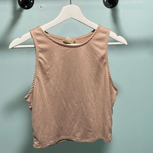 Cream Sleeveless top. Great for summertime casual wear.